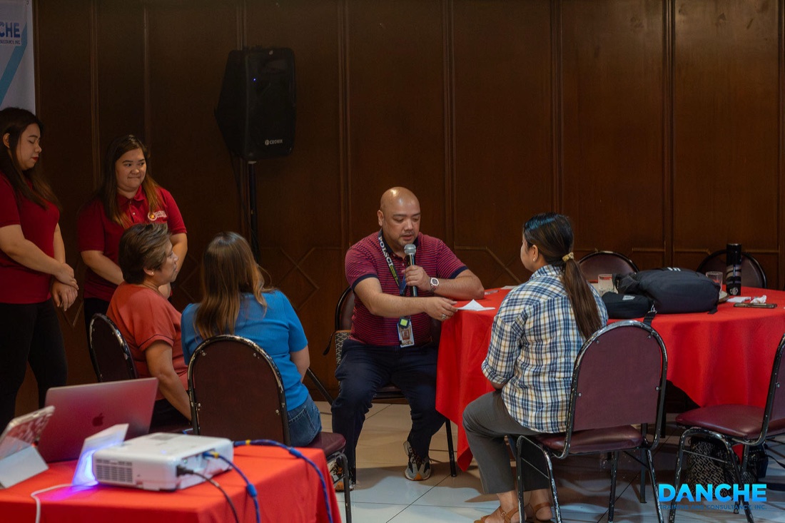 Participants in an experiential small-group breakout session