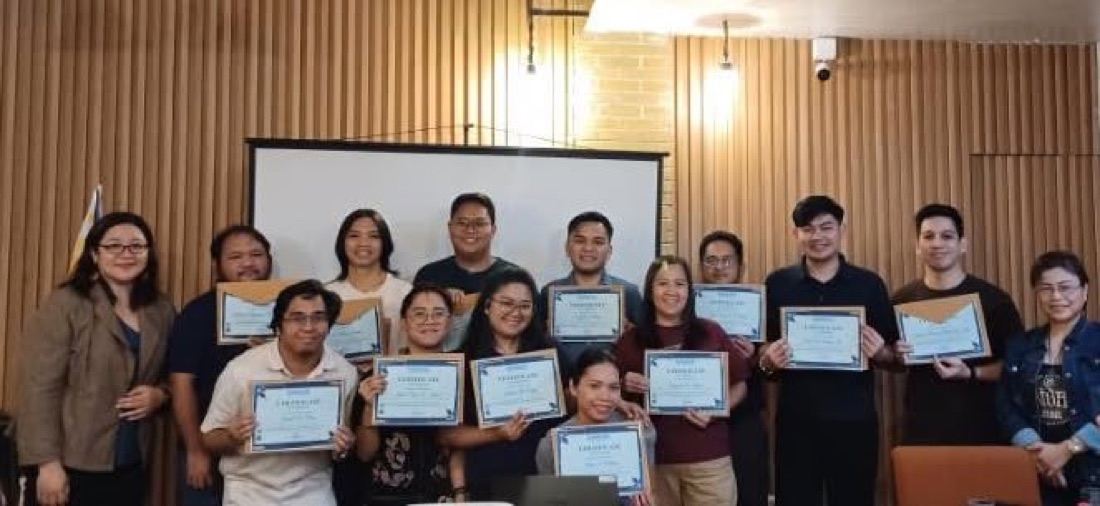 Certificate of Completion being awarded to a participant
